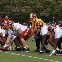 Quarterback Kirk Cousins commands the offensive line. Photo by Terri Russell.