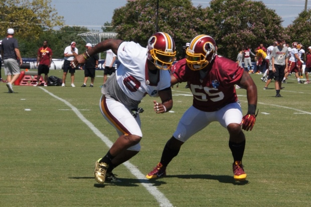 Tight end Niles Paul goes against linebacker Adam Hayward in special teams drills. Photo by Terri Russell.