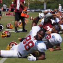 Wide receiver Pierre Garcon stretches before practice. Photo by Terri Russell.