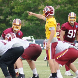 Quarterback Kirk Cousins directs the offense. (Photo by Jake Russell)