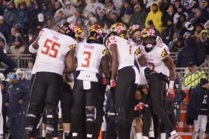 The Terps huddle up. (Photo by Jake Russell)